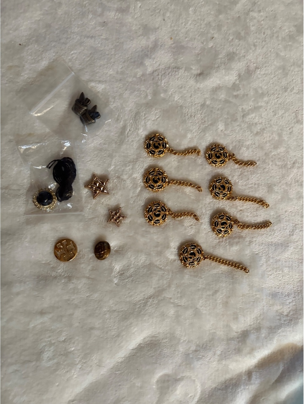 Set of fashionable buttons gold tone star tory burh garden